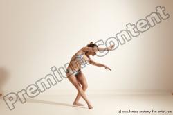 Swimsuit Gymnastic poses Woman White Moving poses Slim long brown Dynamic poses Academic